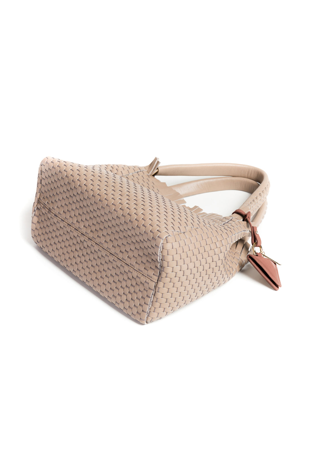 Woven beige handbag with top handles and decorative leather tag.