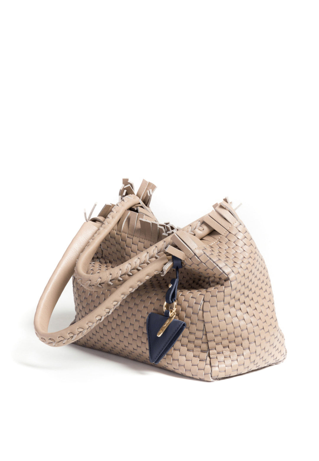 Elegant beige woven handbag with braided handles and a small navy blue accessory.