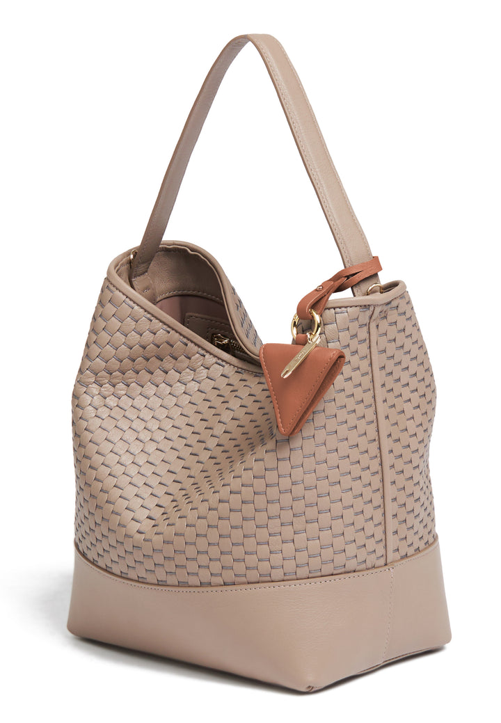 Elegant beige woven leather shoulder bag with adjustable strap and keychain accessory.