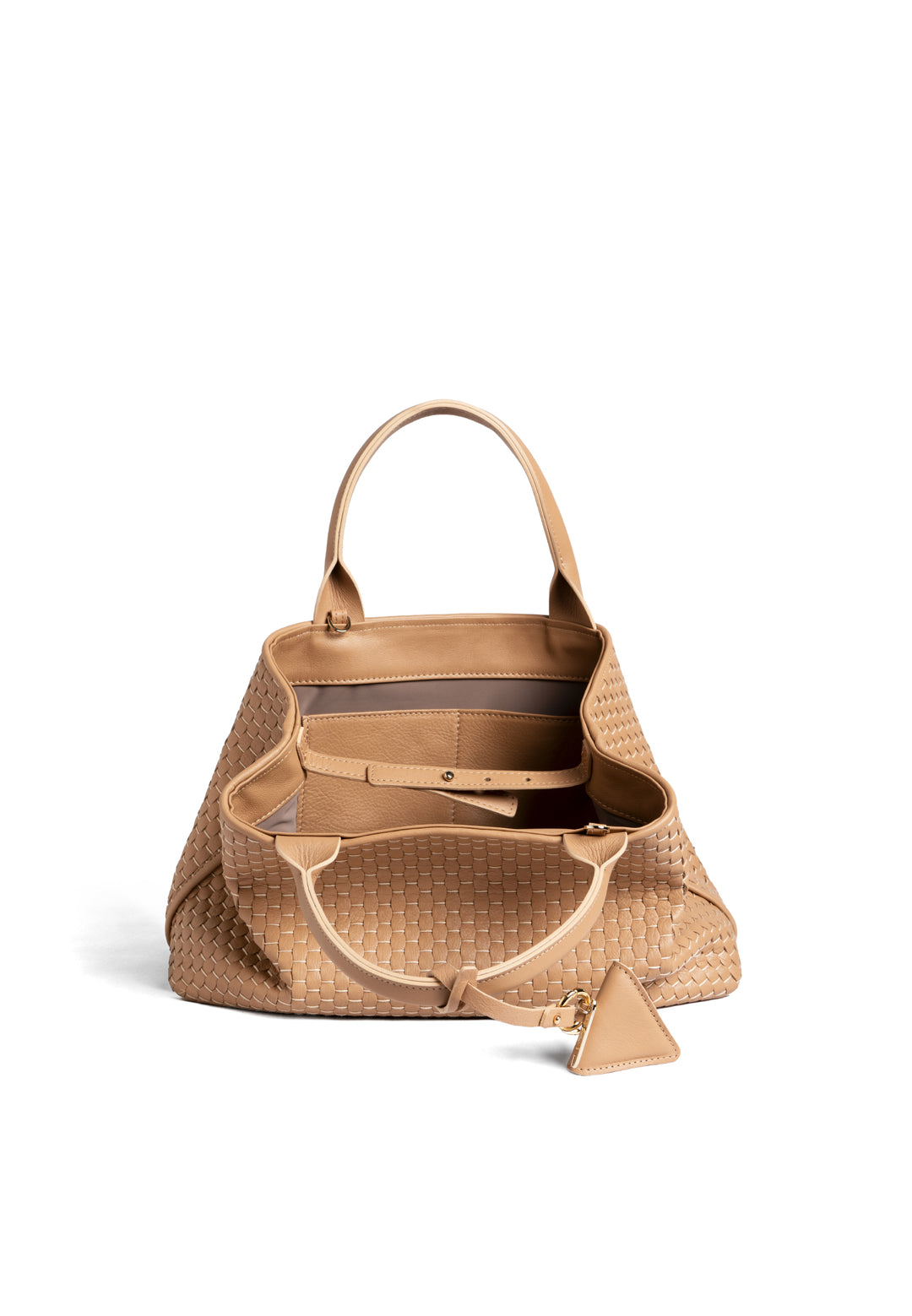 Tan woven leather handbag with dual handles and a triangular charm.