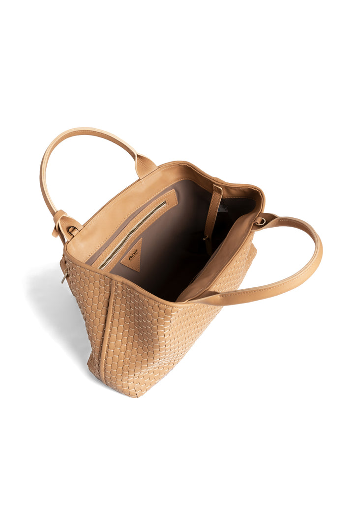 Tan woven leather handbag with dual handles and a triangular charm.