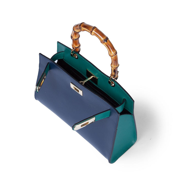 Luxury blue and green handbag with bamboo handle and gold accents