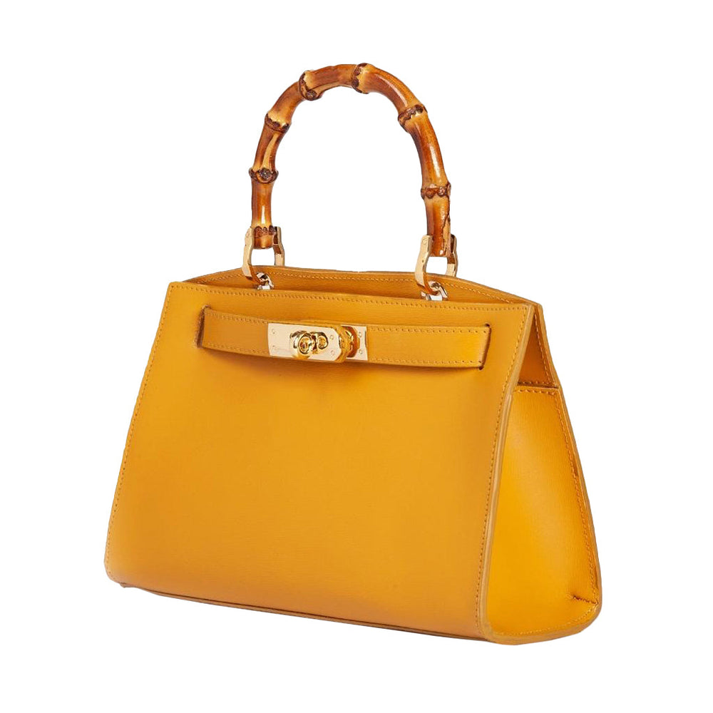 Stylish mustard yellow handbag with bamboo handle and gold accent clasp