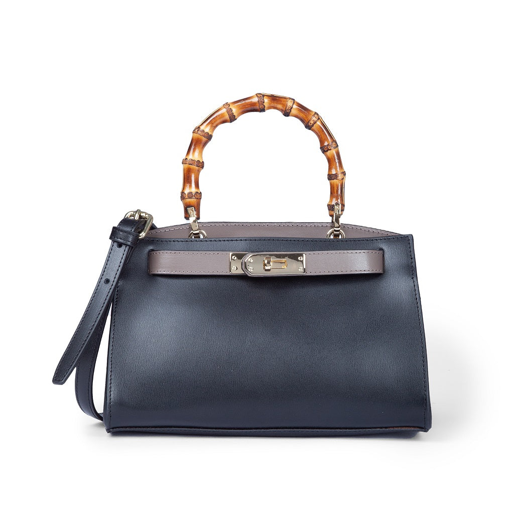 Elegant black leather handbag with bamboo handle and gold clasp