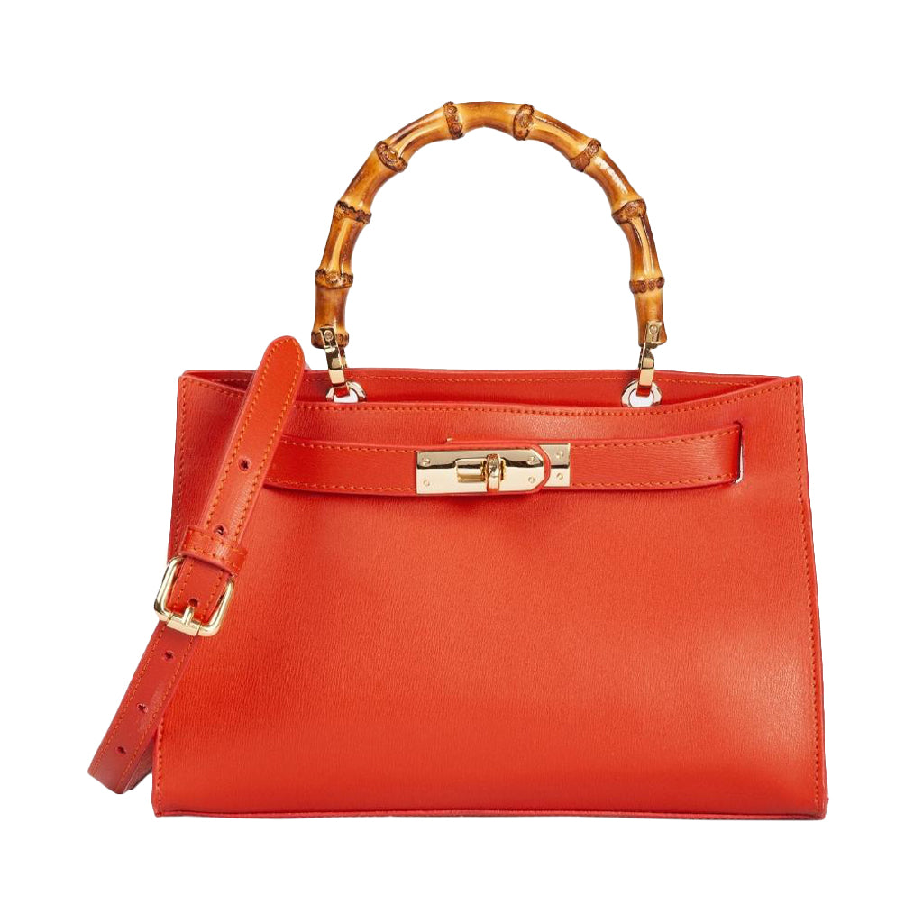 Luxe orange leather handbag with bamboo handle and gold hardware