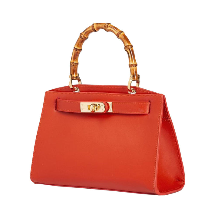 Red leather handbag with bamboo handle and gold clasp