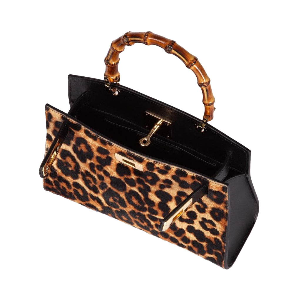 Leopard print handbag with bamboo handle and gold accents