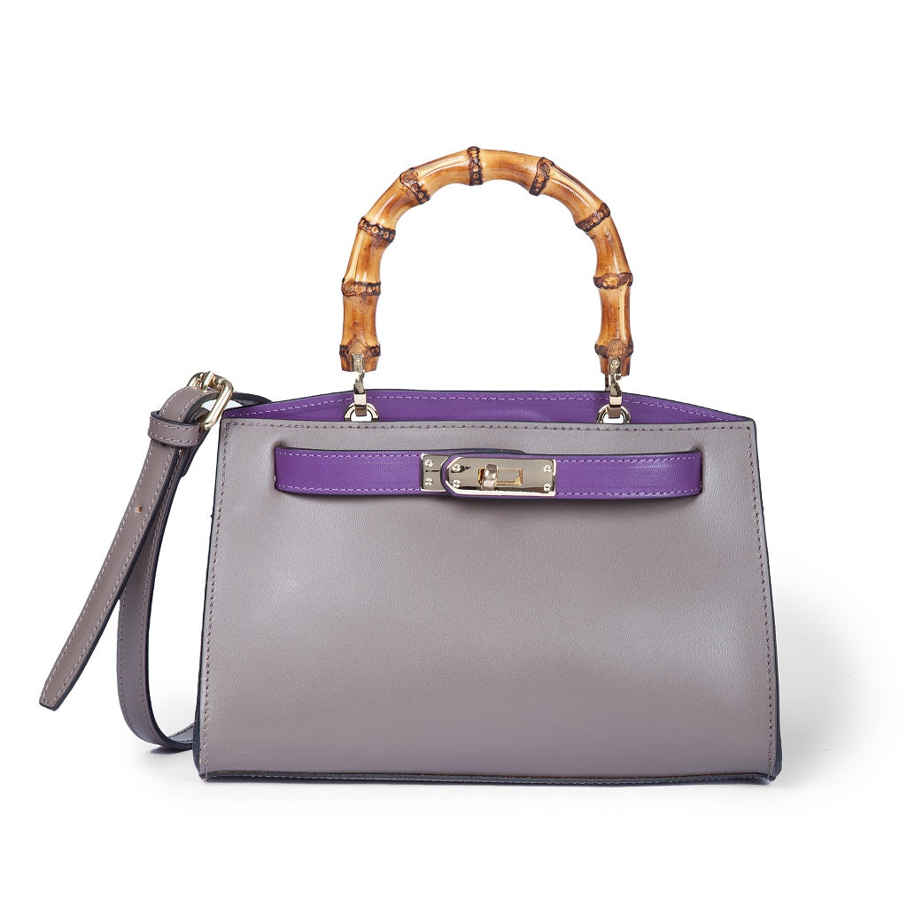 Elegant gray handbag with bamboo handle and purple accents