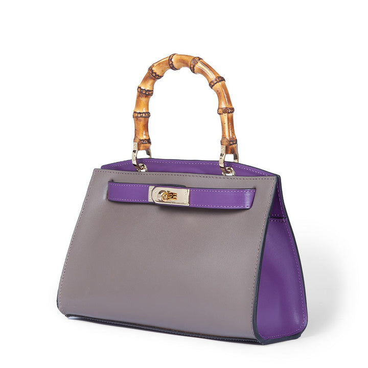 Elegant gray handbag with bamboo handle and purple accents