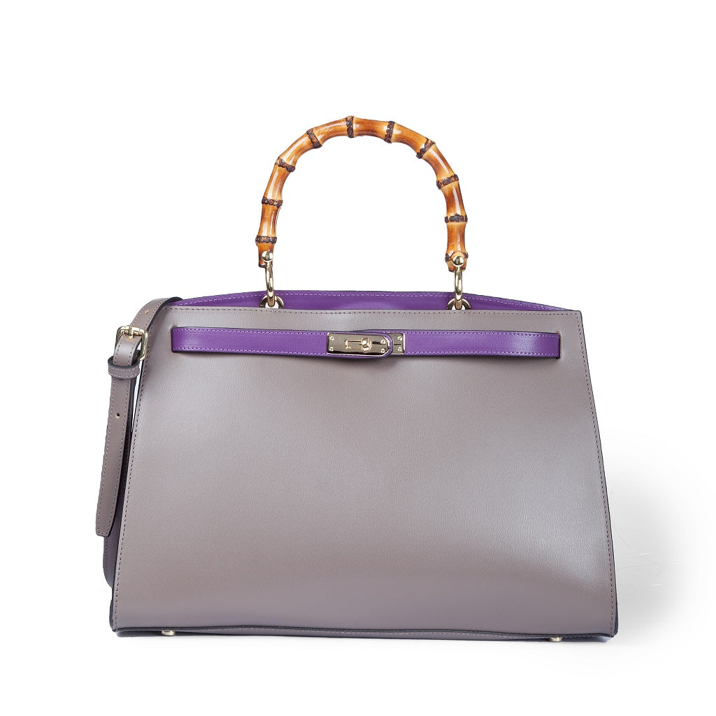 Gray leather handbag with bamboo handle and purple accents
