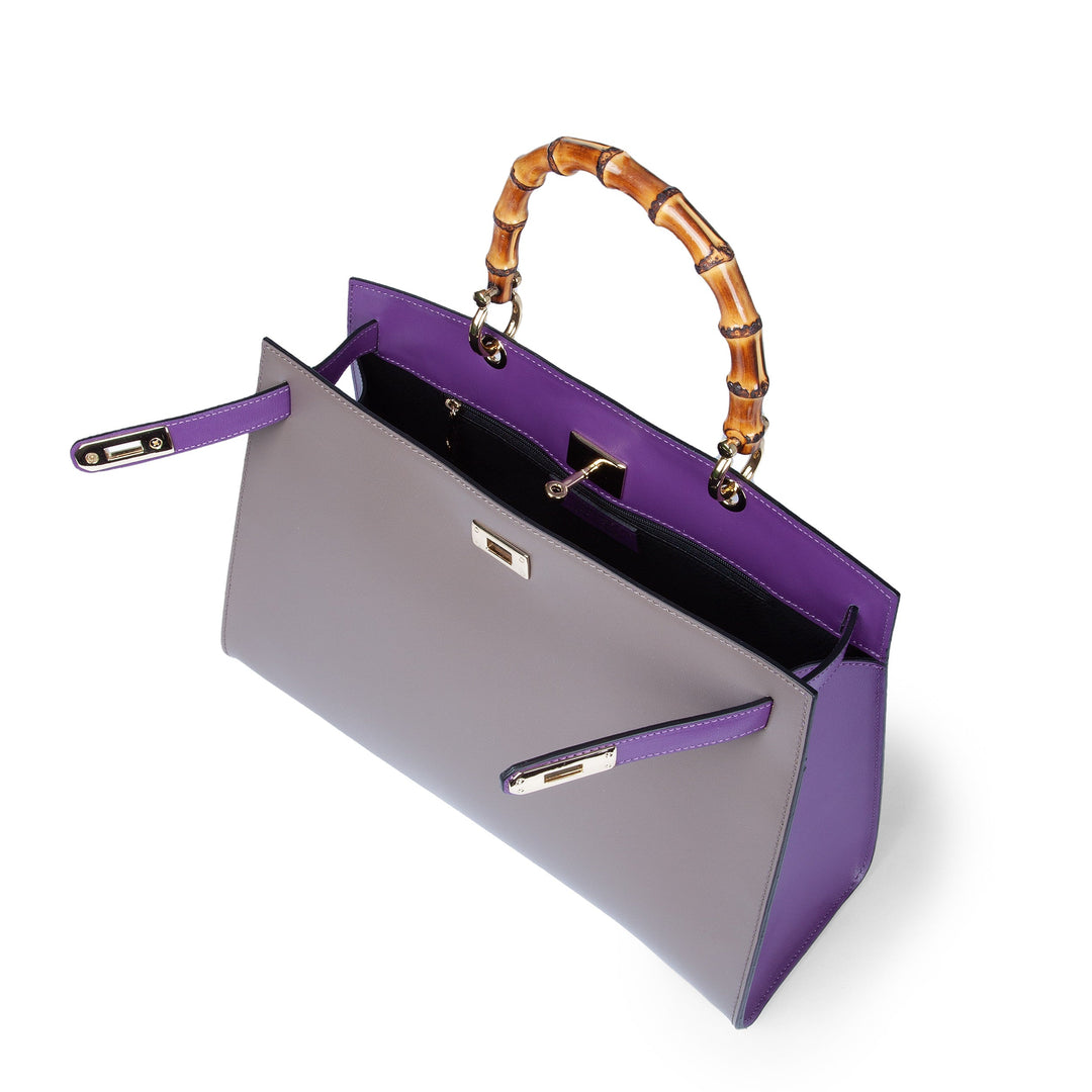 Purple and gray handbag with bamboo handle and gold accents