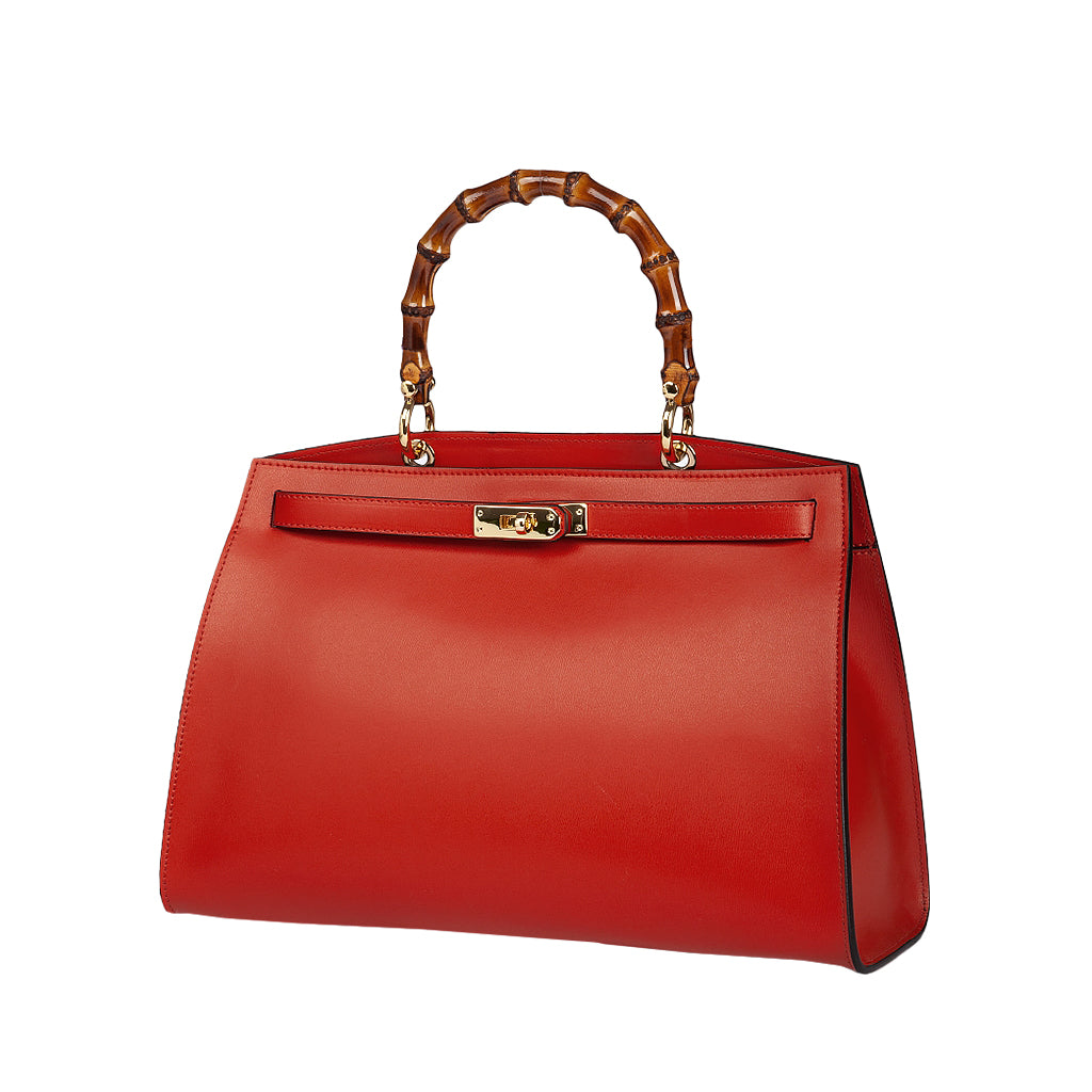 Red leather handbag with bamboo handle and gold clasp