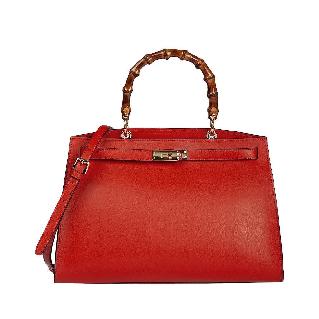 Red leather handbag with bamboo handle and adjustable shoulder strap