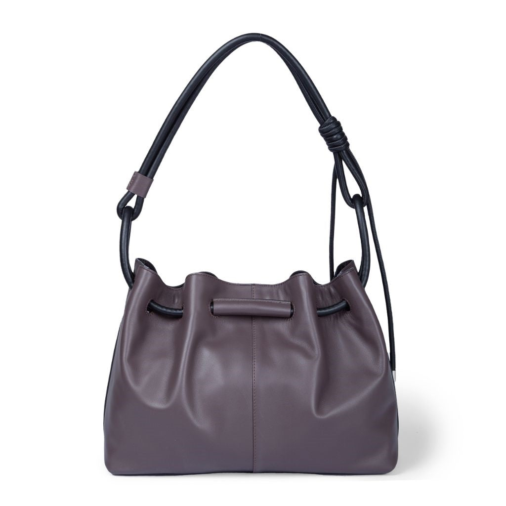 Elegant dark purple leather handbag with shoulder strap and gathered detailing