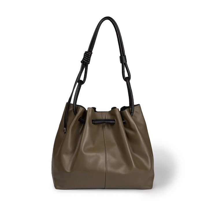 Olive green leather tote bag with black handles