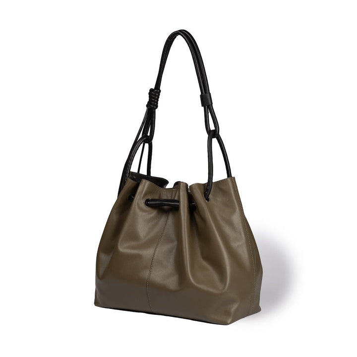 Olive green leather bucket bag with black handles