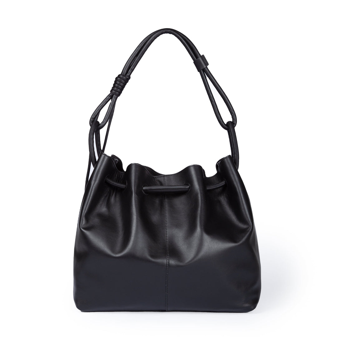 Black leather handbag with drawstring closure and shoulder straps