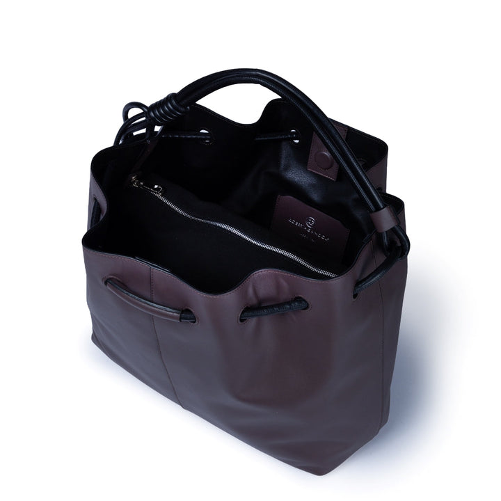 Luxurious dark brown leather handbag with open top displaying interior pockets and black handles