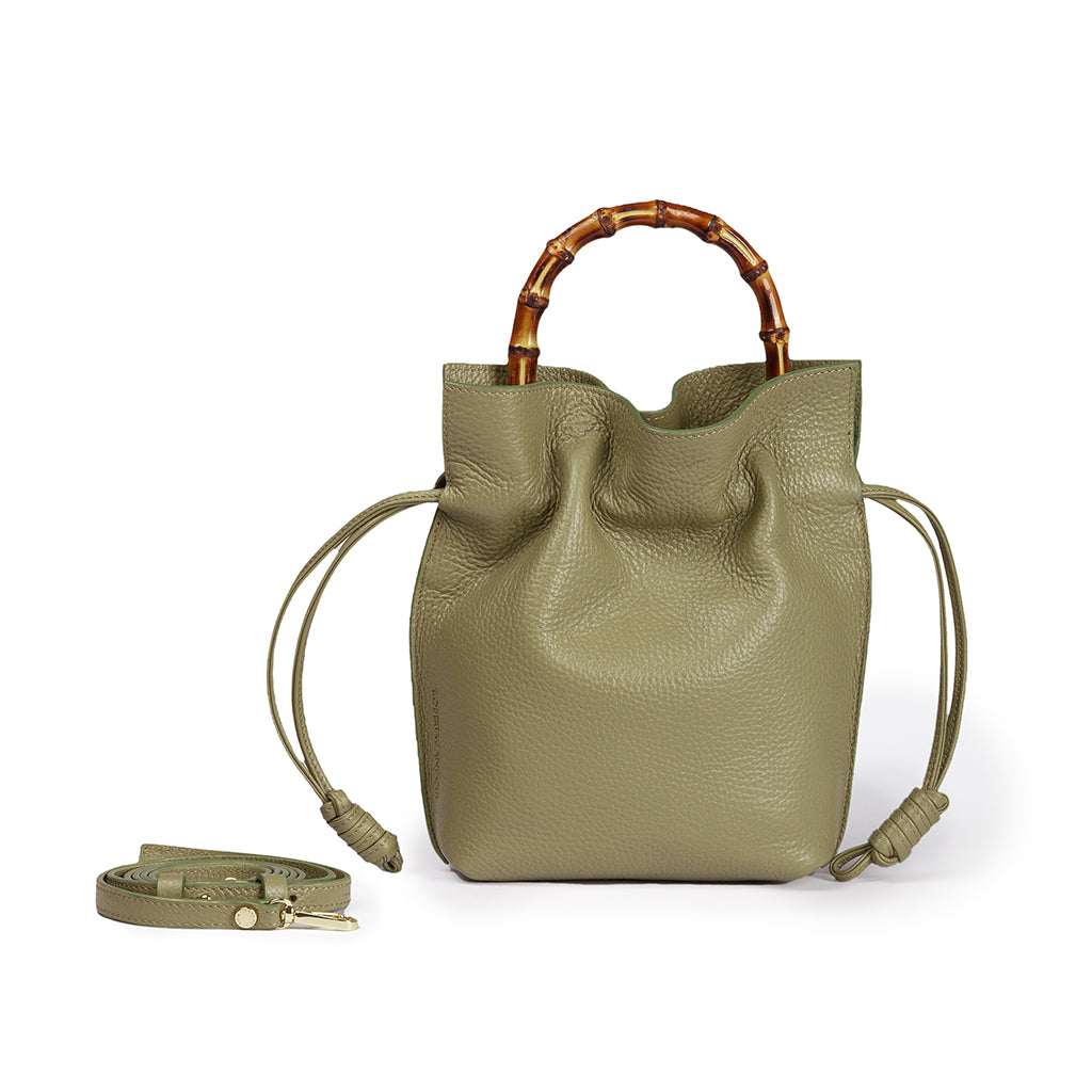 Olive green leather handbag with wooden handle and detachable strap