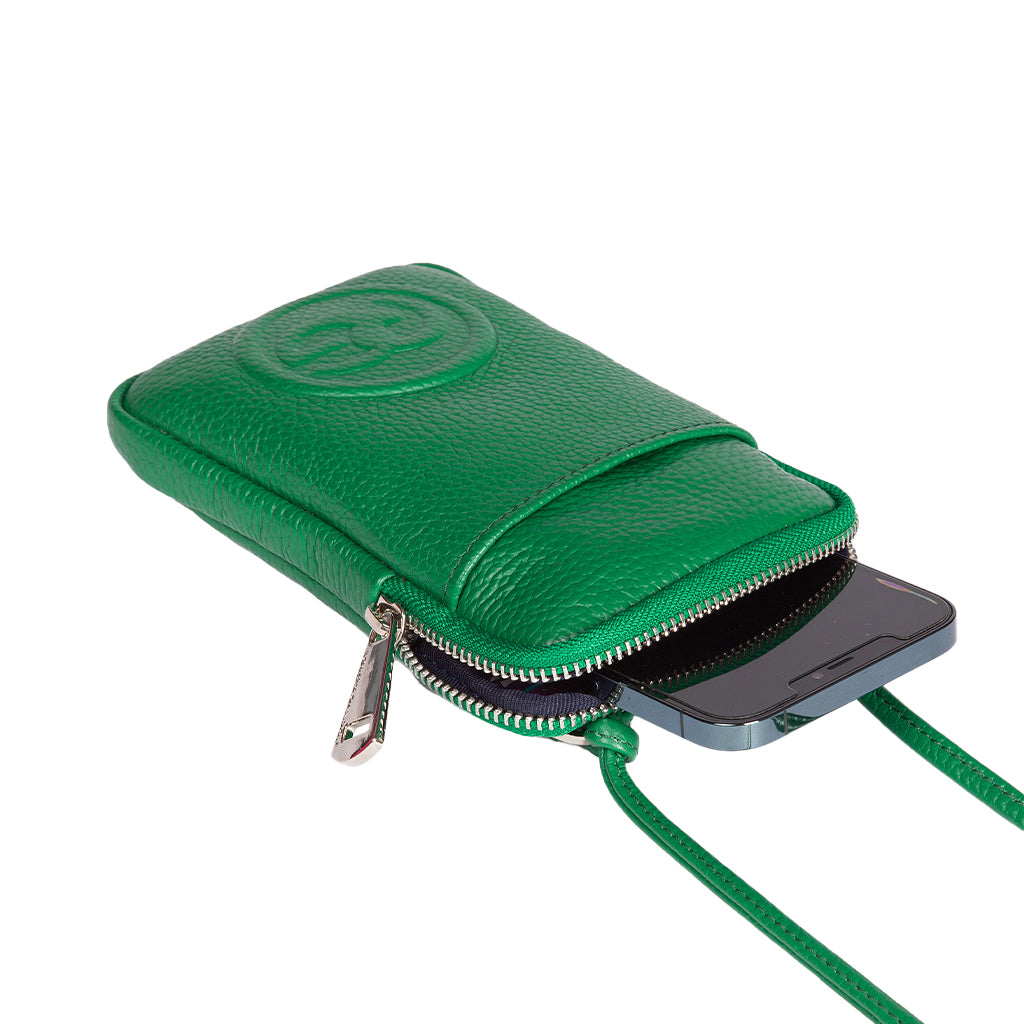 Green leather phone pouch with zipper and embossed logo holding a black smartphone