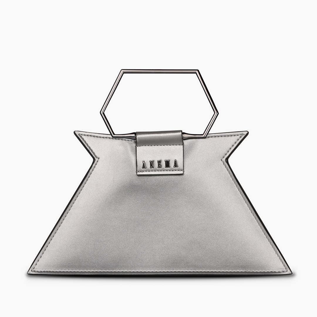 Modern geometric silver handbag with metallic handle and sleek design