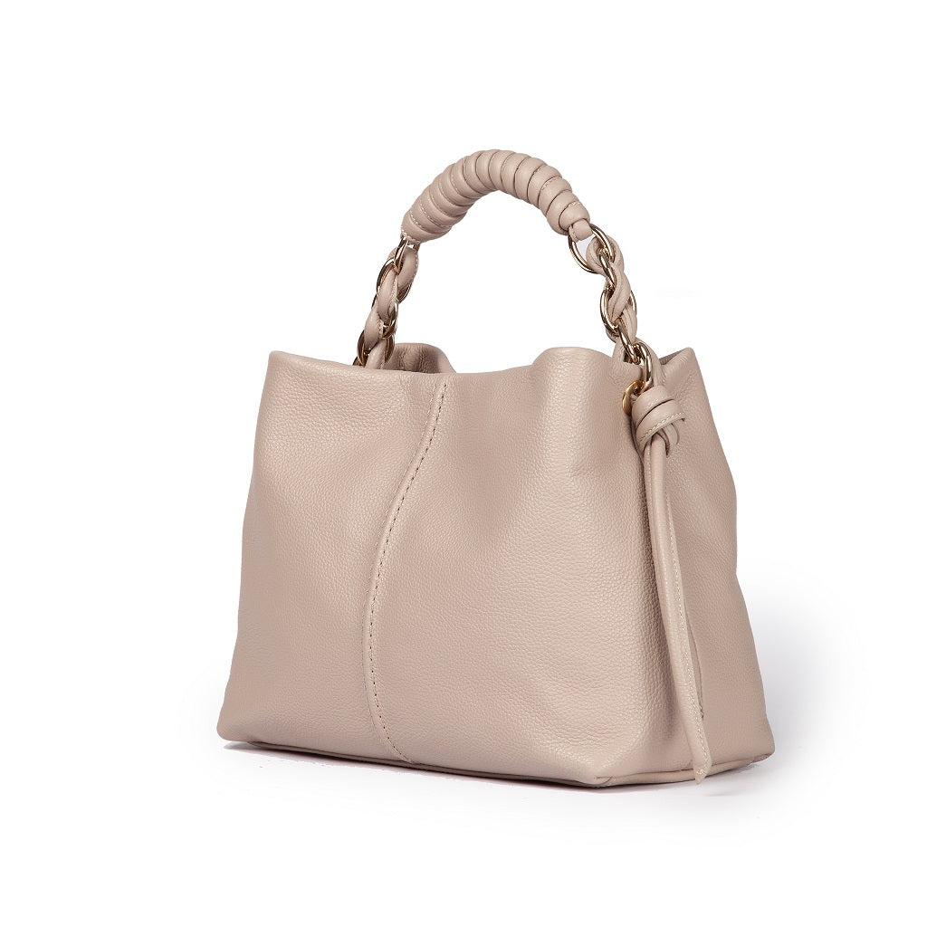 Beige leather handbag with braided handle and gold-tone hardware