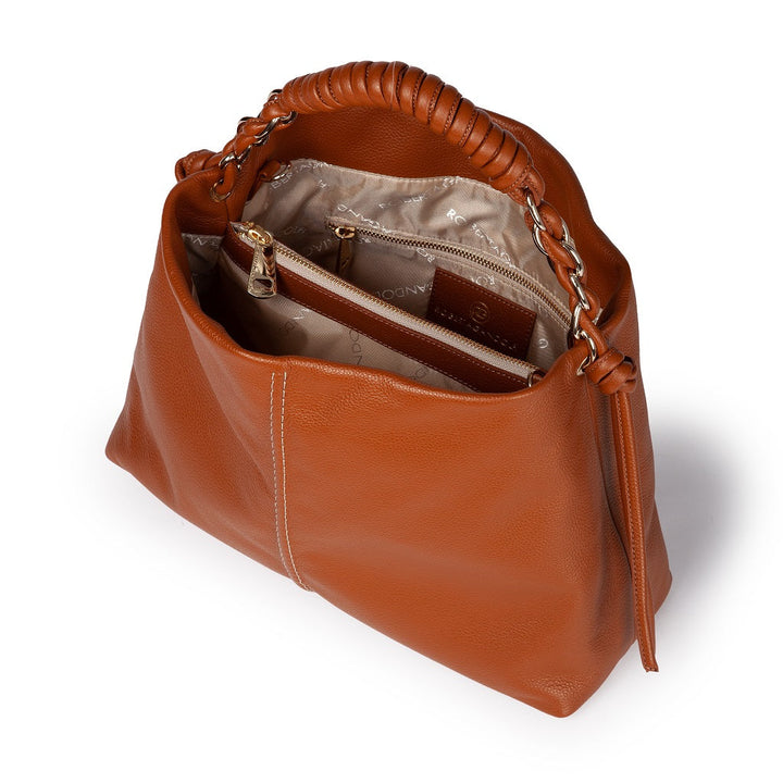 Women's brown leather handbag with braided handle, open to show interior pockets and zippers