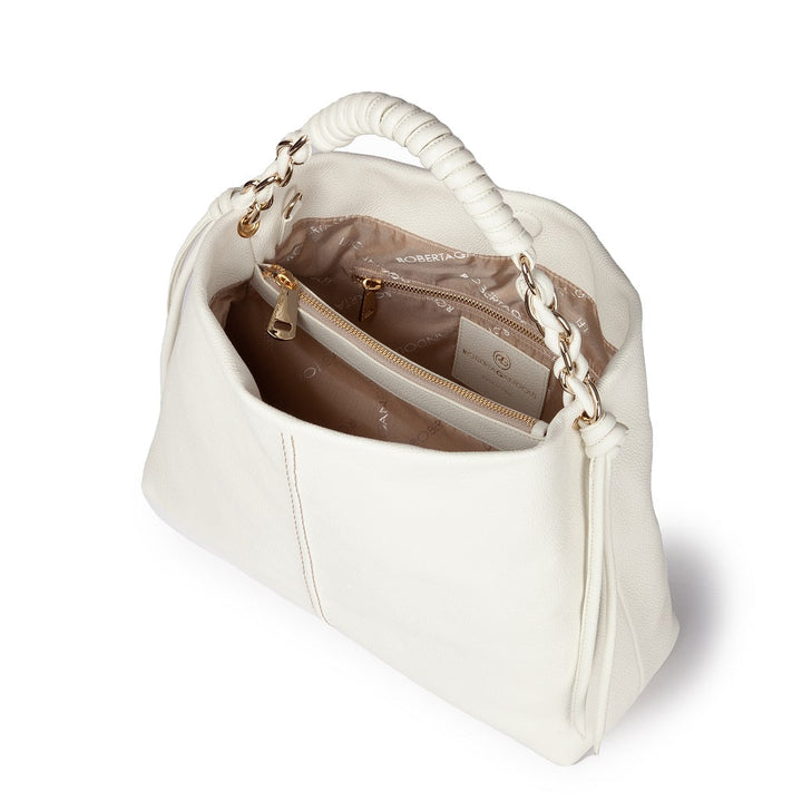 White leather handbag with gold accents and open view of interior pockets