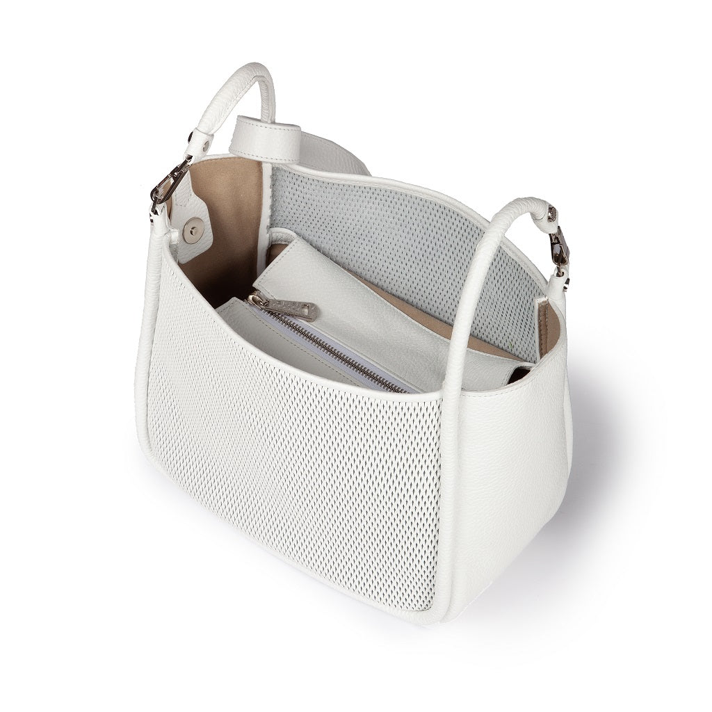 White leather handbag with open top showing interior pockets and mesh side panel