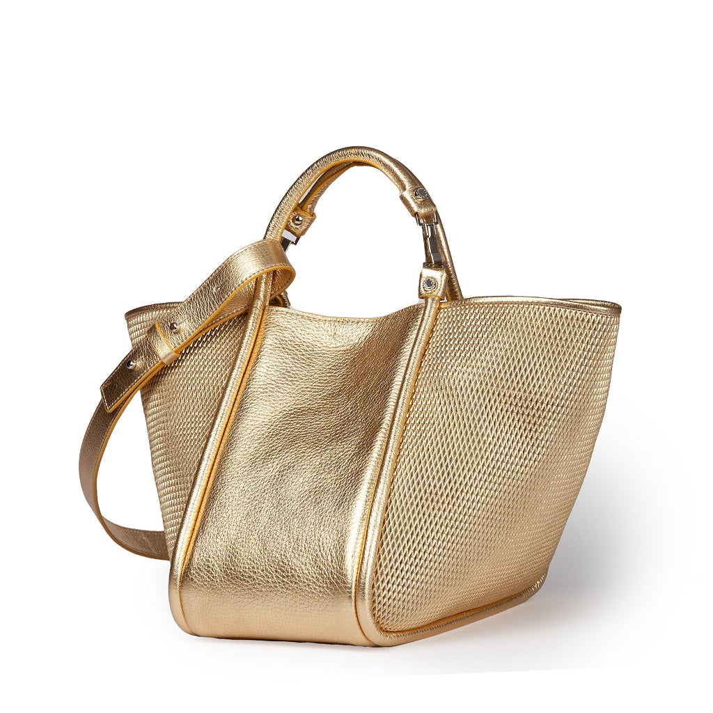 Gold tote handbag with textured sides and adjustable shoulder strap