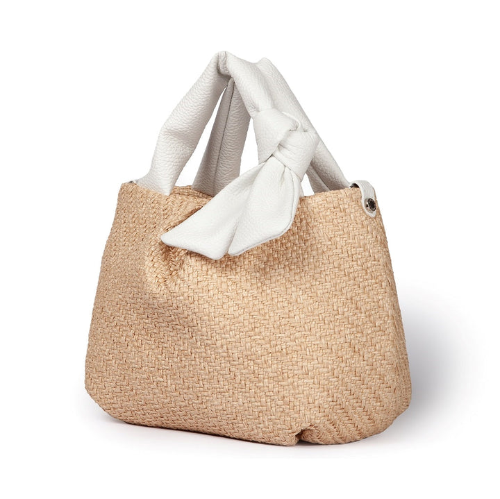 Beige woven handbag with white leather handles and a knot detail
