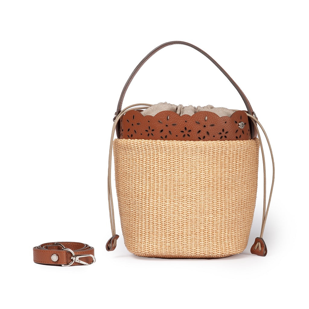 Stylish woven handbag with leather accents and detachable strap