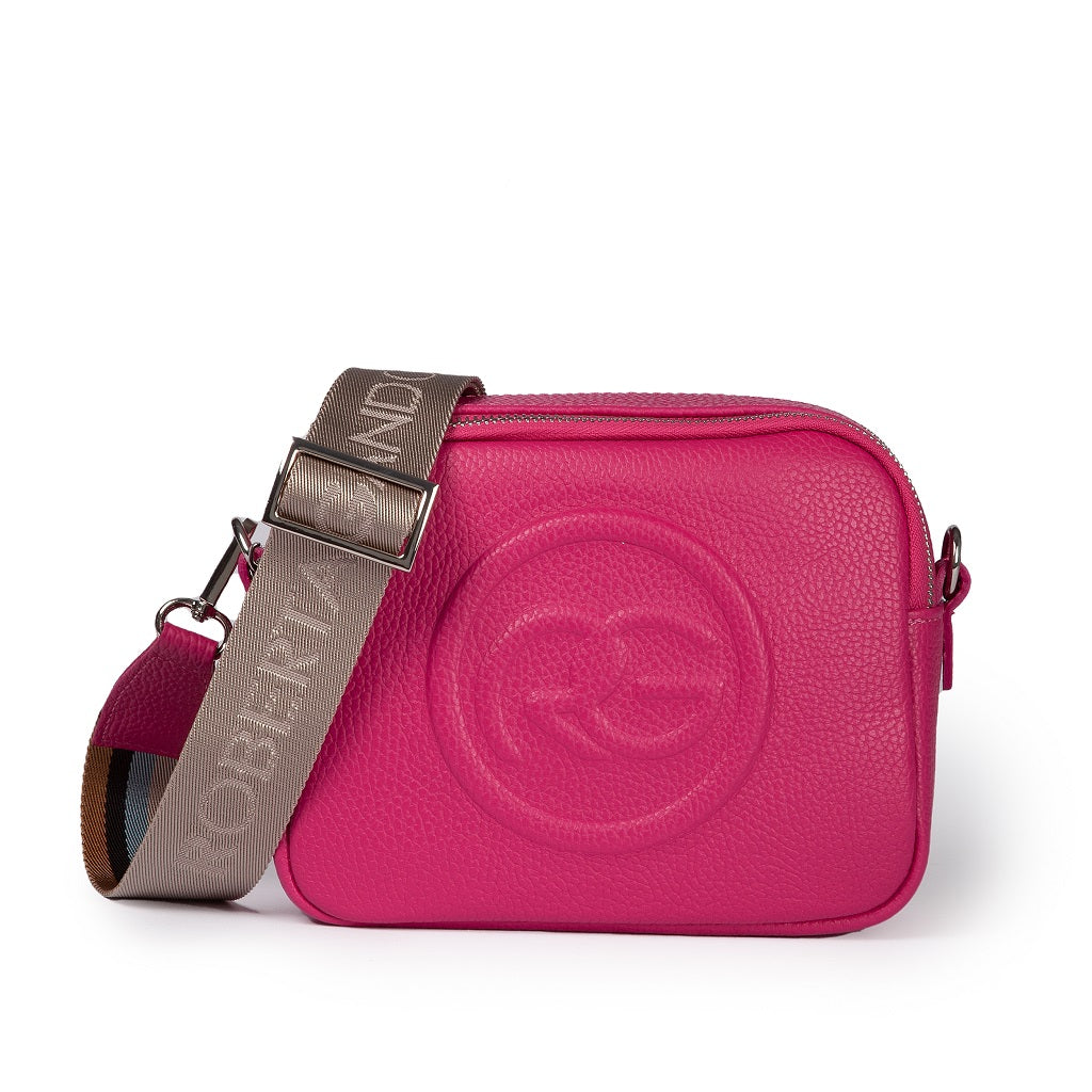 Bright pink leather handbag with adjustable branded shoulder strap