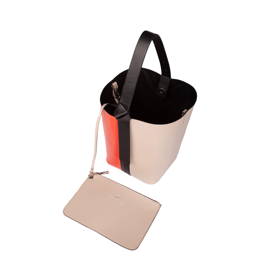 Two-tone bucket bag with detachable pouch on white background