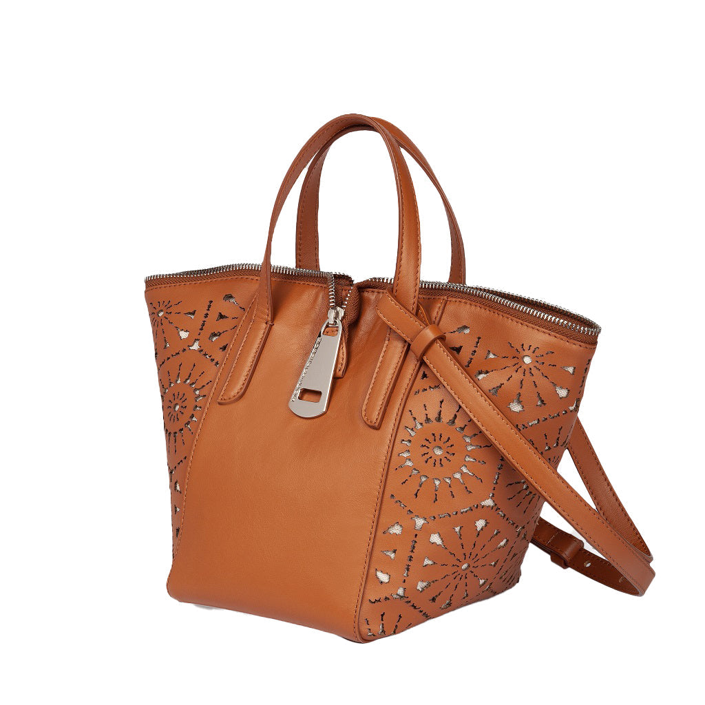 Brown leather handbag with intricate cut-out design and top handles