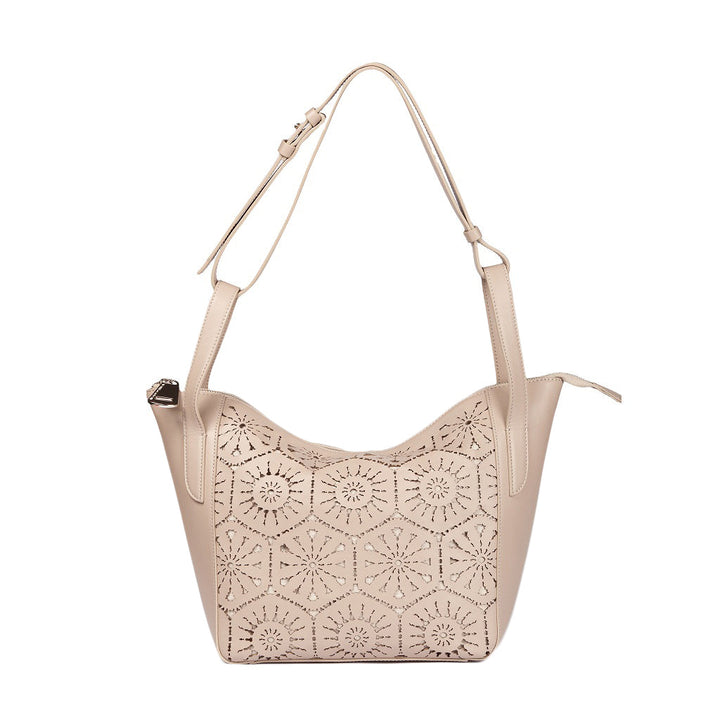 Beige leather handbag with intricate floral cutout design and adjustable shoulder strap