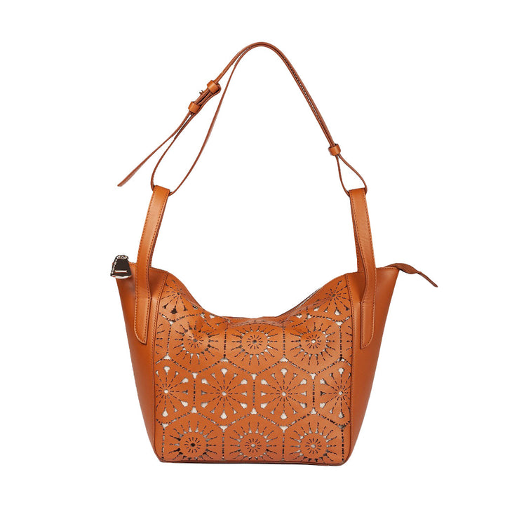 Tan leather shoulder bag with intricate cutout design