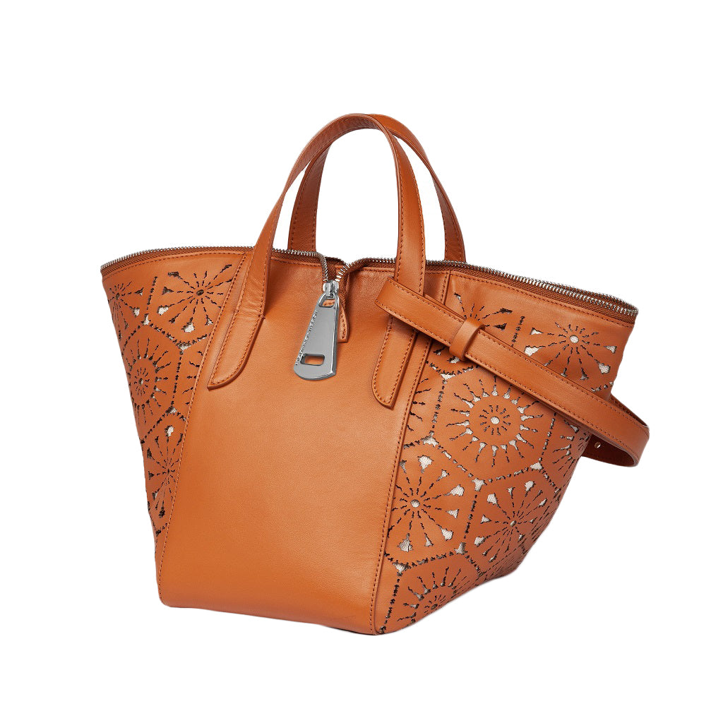 Brown leather handbag with intricate cut-out design and shoulder strap