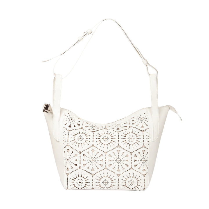 White leather handbag with intricate lace pattern and adjustable strap