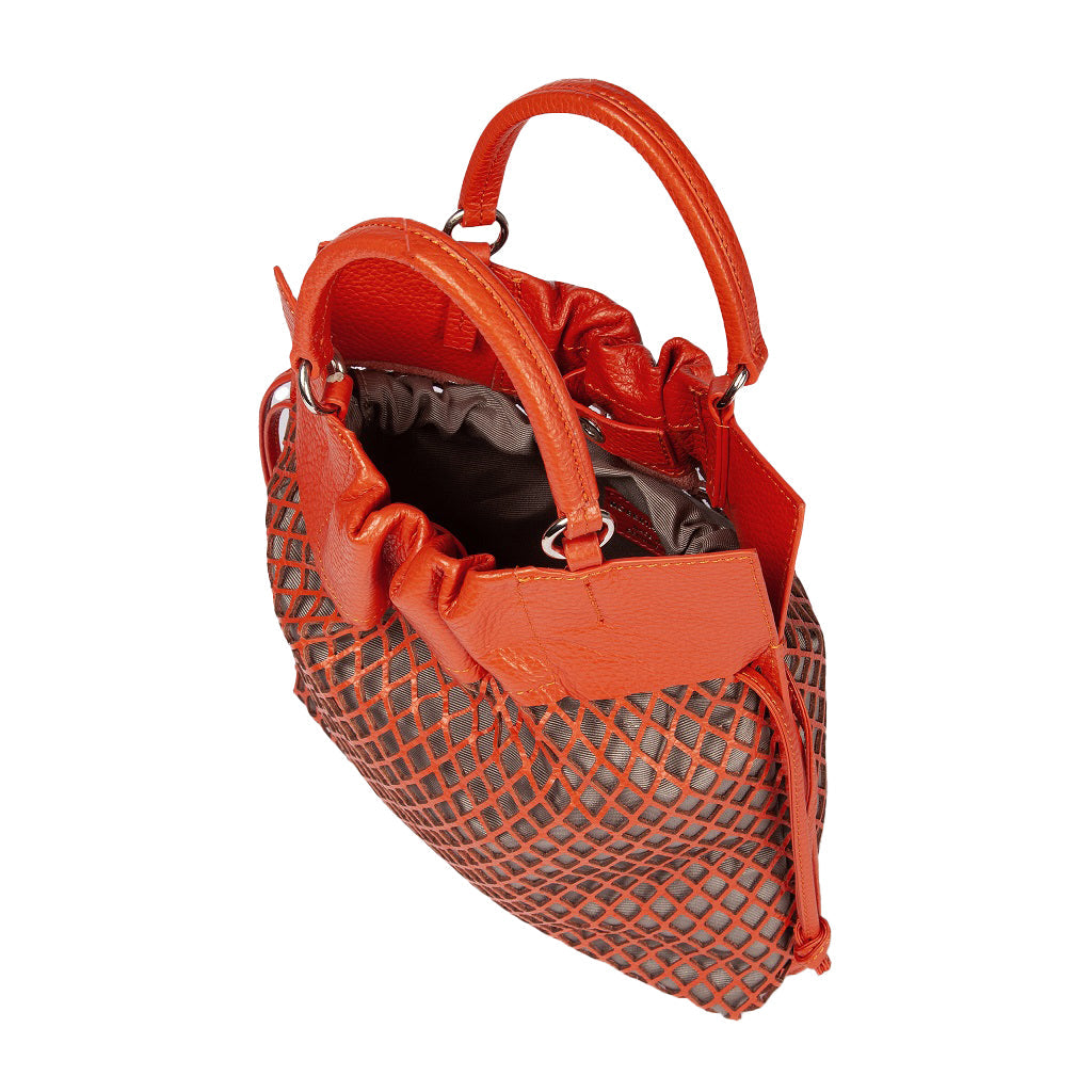 Orange designer handbag with netted exterior and leather handles