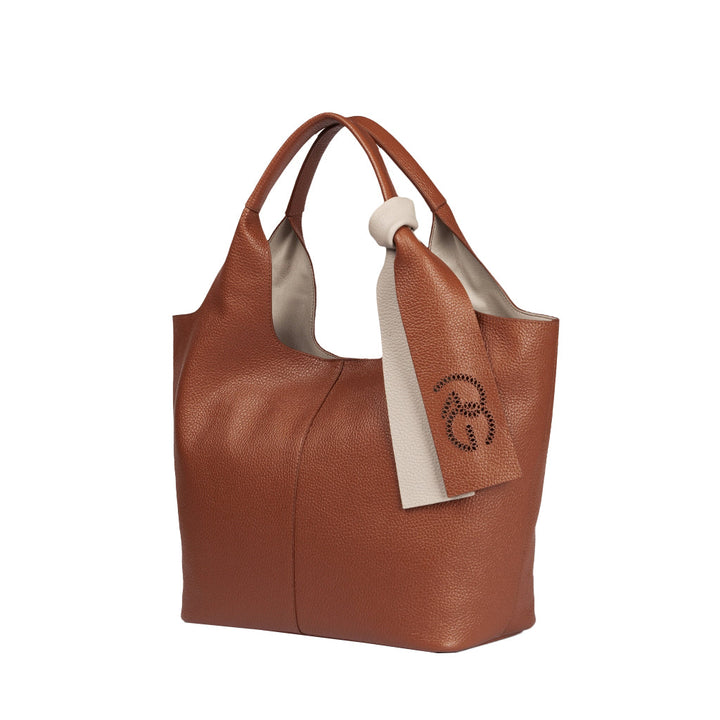 Elegant brown leather handbag with attached scarf accessory