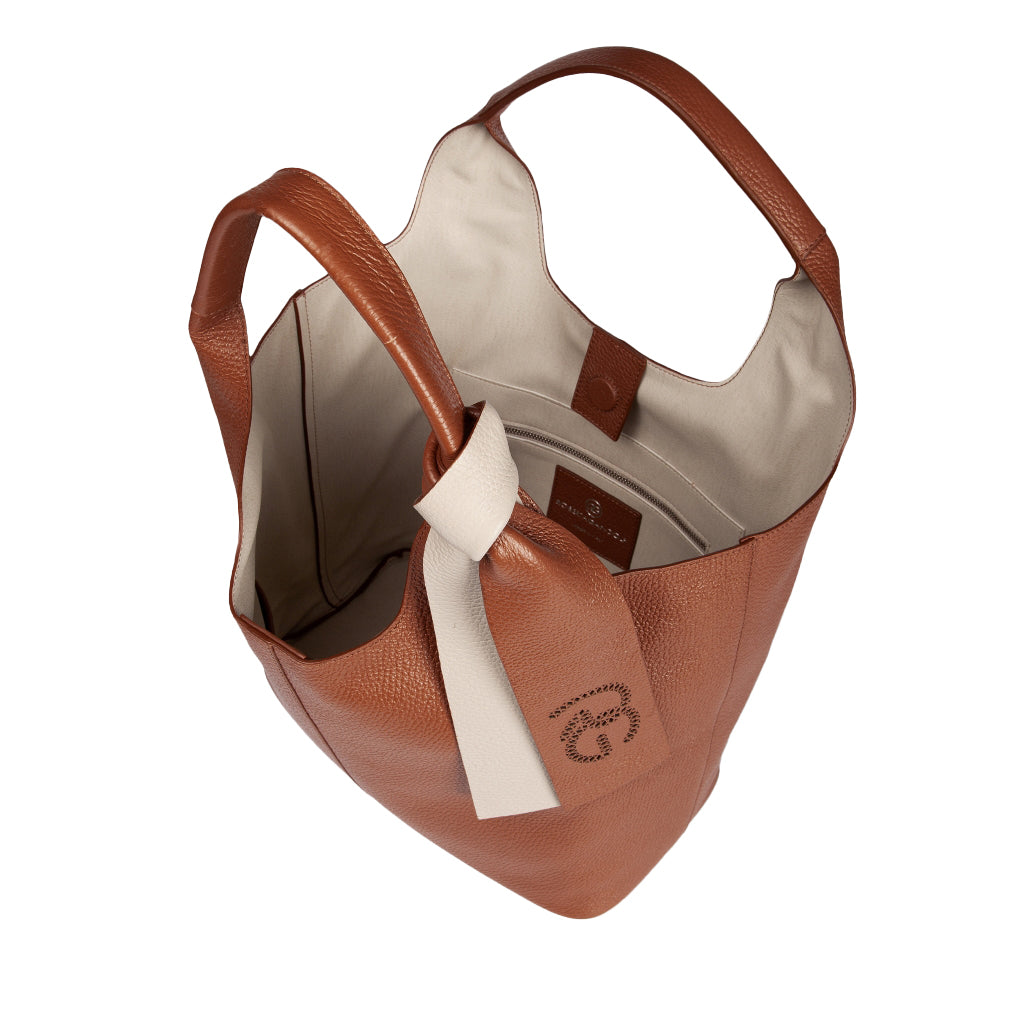 Brown leather handbag with beige interior and logo detail