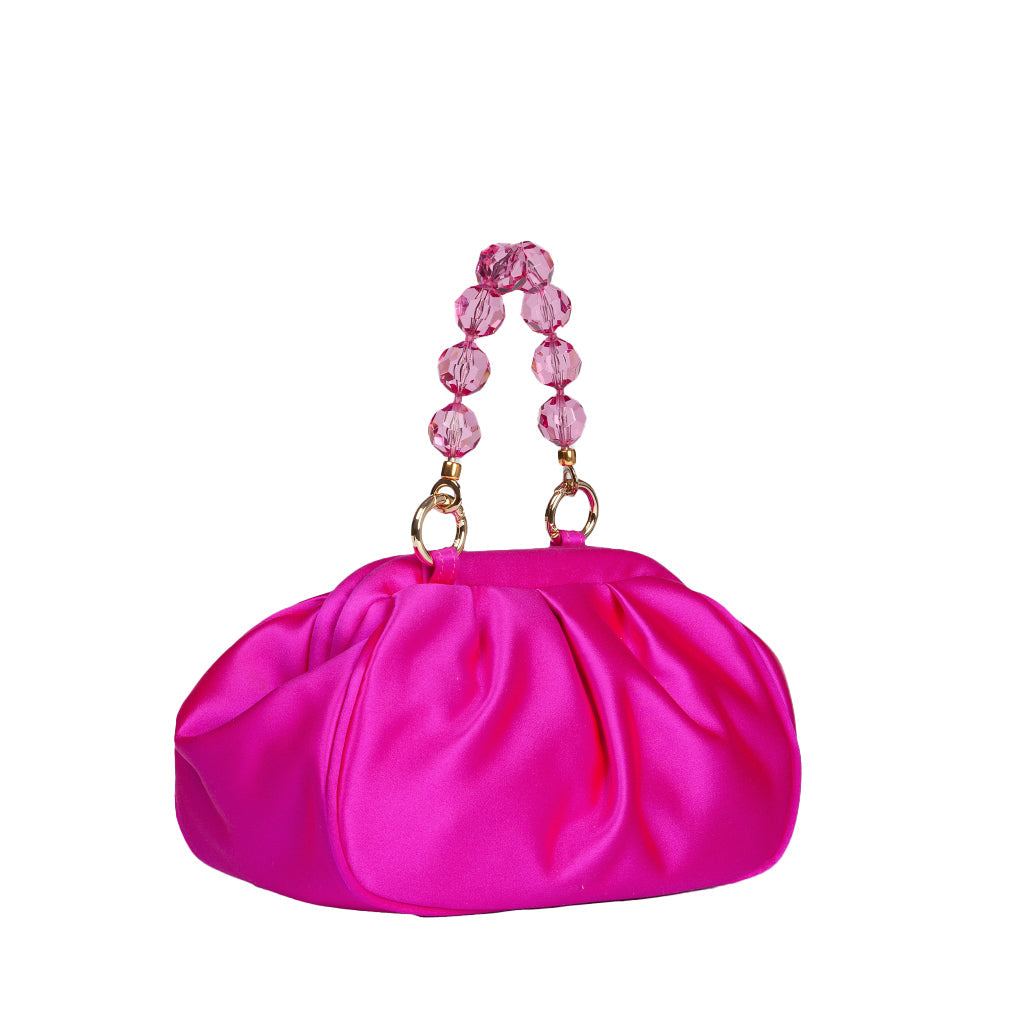 Bright pink satin clutch bag with beaded handle