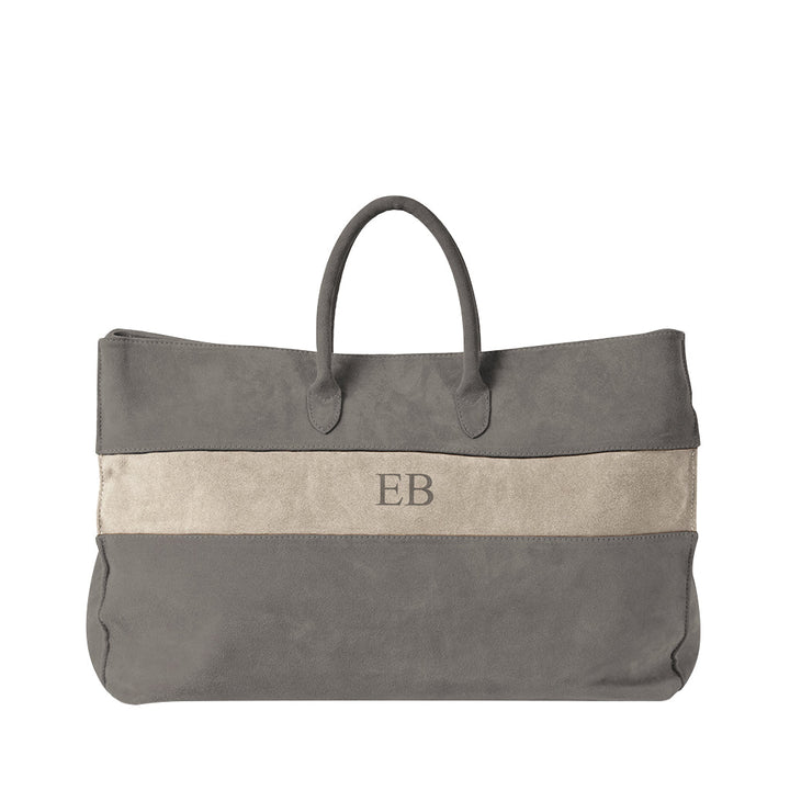 Gray suede tote bag with beige stripe and initials EB embroidered in the center