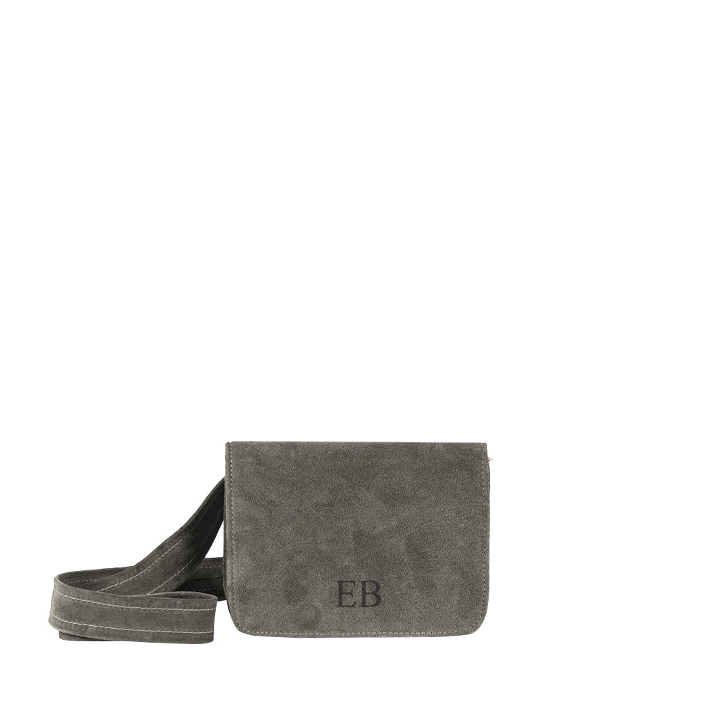 Gray suede crossbody bag with embossed initials EB and adjustable strap