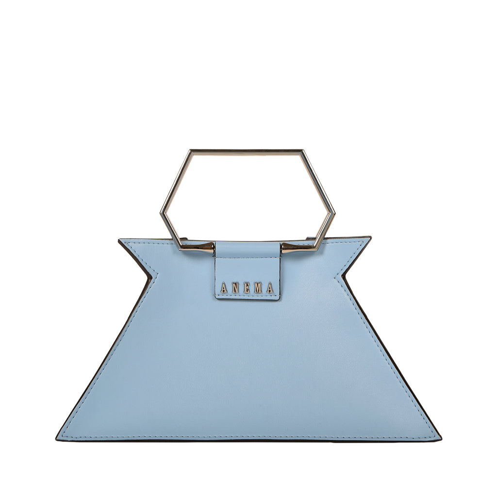 Light blue designer handbag with hexagonal handle and ANEMA label
