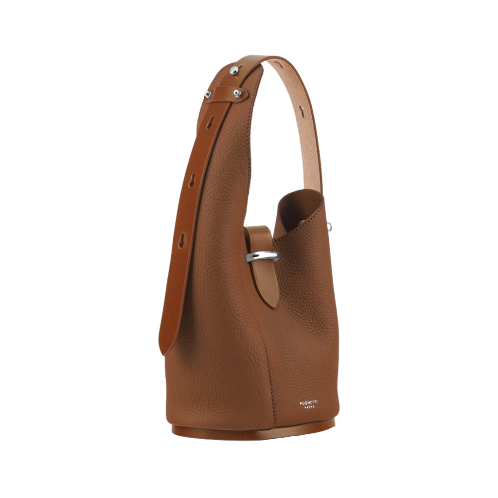 Brown leather handbag with adjustable strap and silver hardware