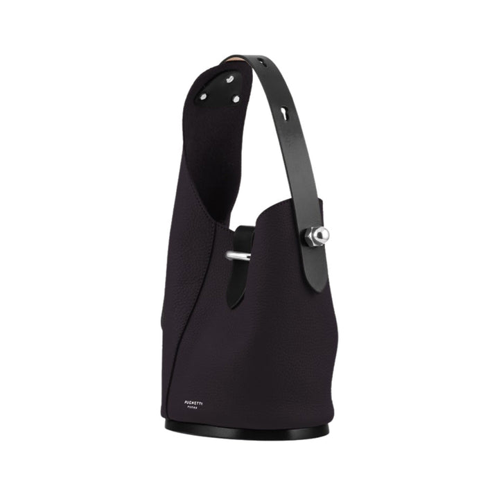 Sleek black leather bucket bag with modern metal accents