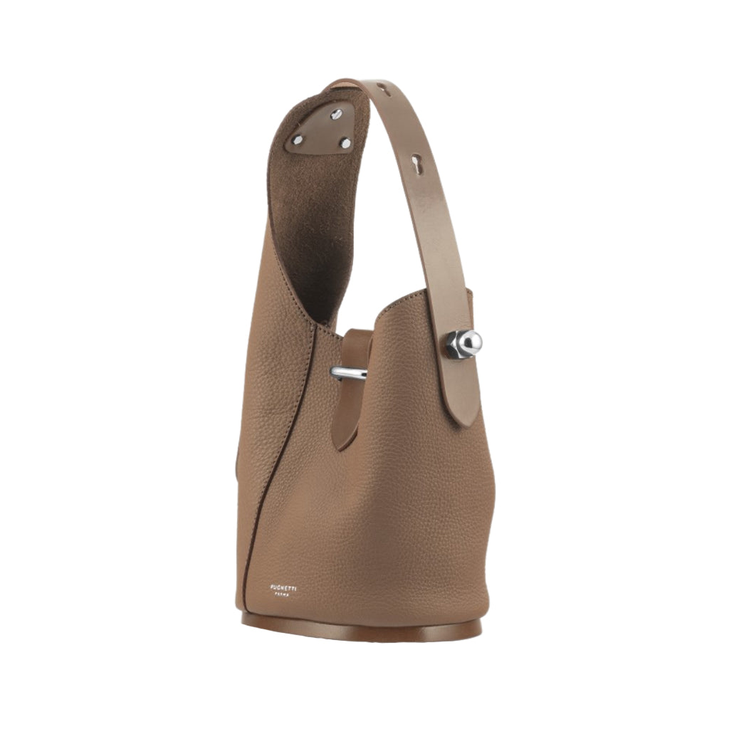 Brown leather bucket bag with silver hardware and an adjustable strap