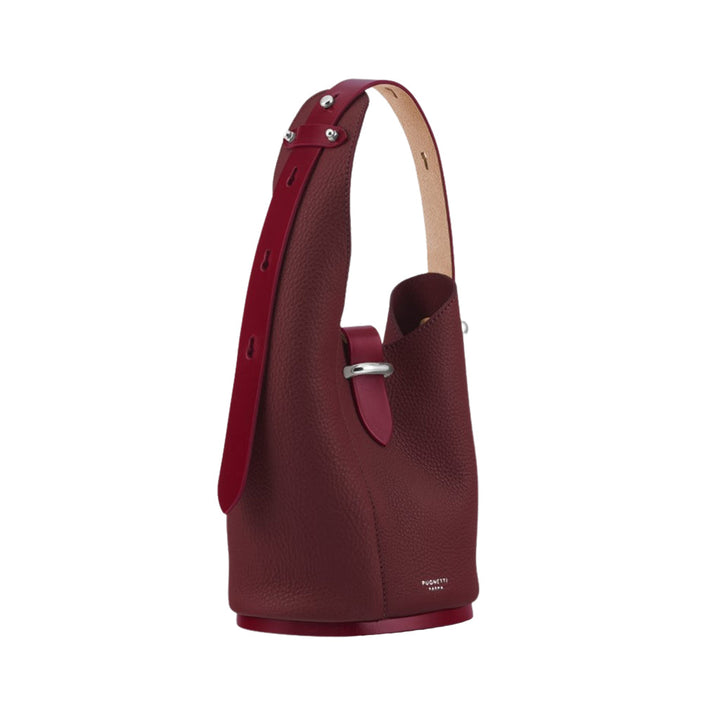 Elegant maroon leather handbag with adjustable strap and silver buckle from Polene Paris